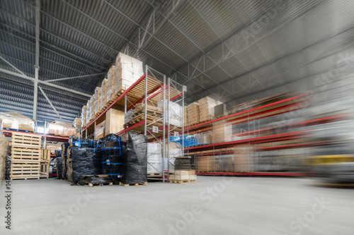 Long shelves with a variety of boxes and containers.