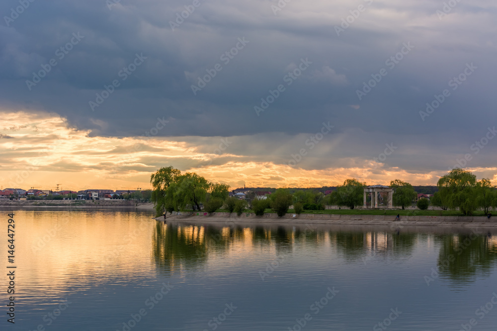 Fototapeta premium A Beautiful Storm and Sunset Reflection