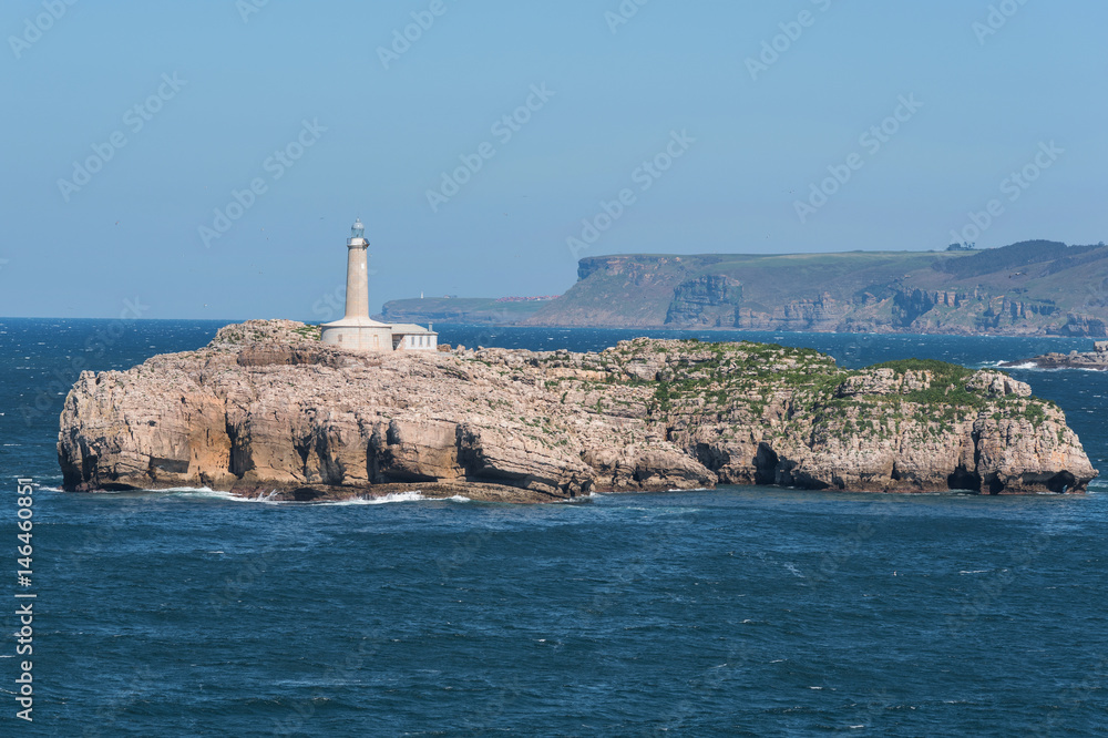 Mouro island lighthouse in Santander, Cantabria, Spain.