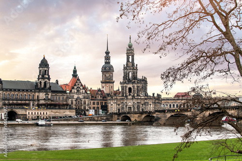 church Hofkirche and a bridge over the river Elbe in Dresden with old town castle photo