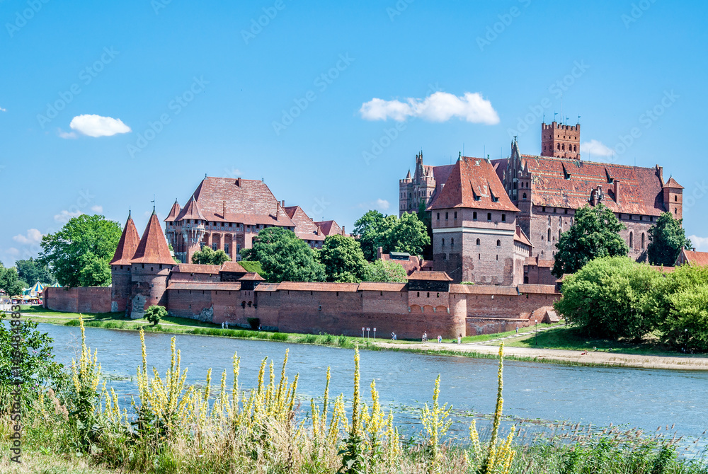 Medieval Malbork Castle in Poland, main fortress of the Teutonic Knights and the Nogat river.