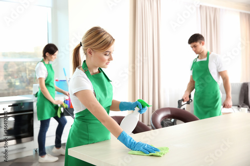 Housekeeping team cleaning kitchen