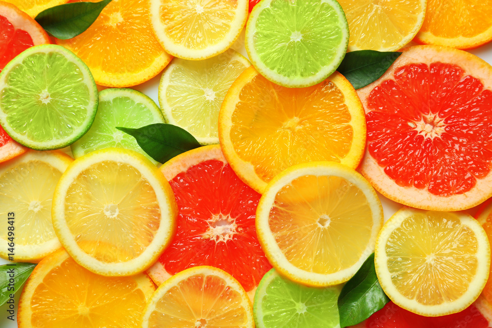 Sliced citrus fruits background Sliced citrus fruits background