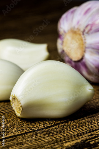 fresh violet garlic on the wooden table