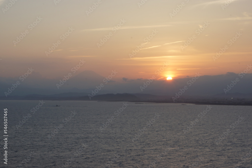 Sunset on the island of Enoshima with sea and mount Fuji (Fujisawa city - Kanagawa prefecture - Japan)
