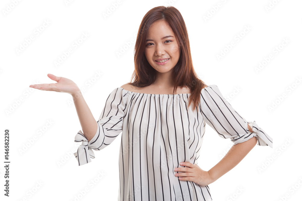 Young Asian woman present with her hand. Young Asian woman present with her hand.