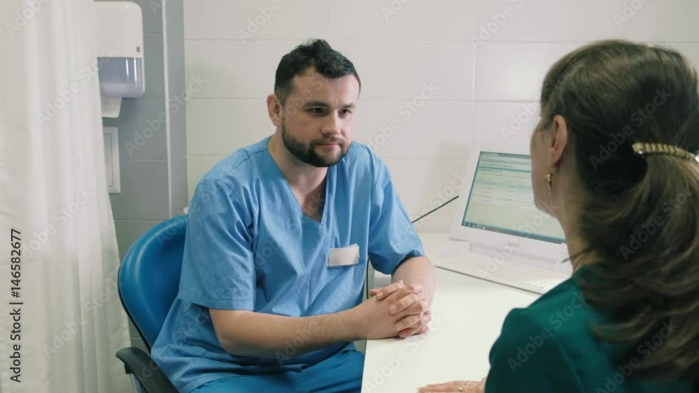 A young woman consults a doctor about gastroscopy 4k A young woman consults a doctor about gastroscopy 4k