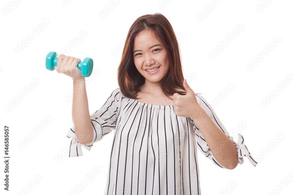 Healthy Asian woman thumbs up with dumbbells. Healthy Asian woman thumbs up with dumbbells.