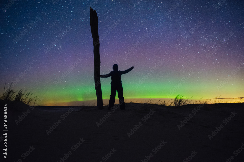 Human silhouette against night sky