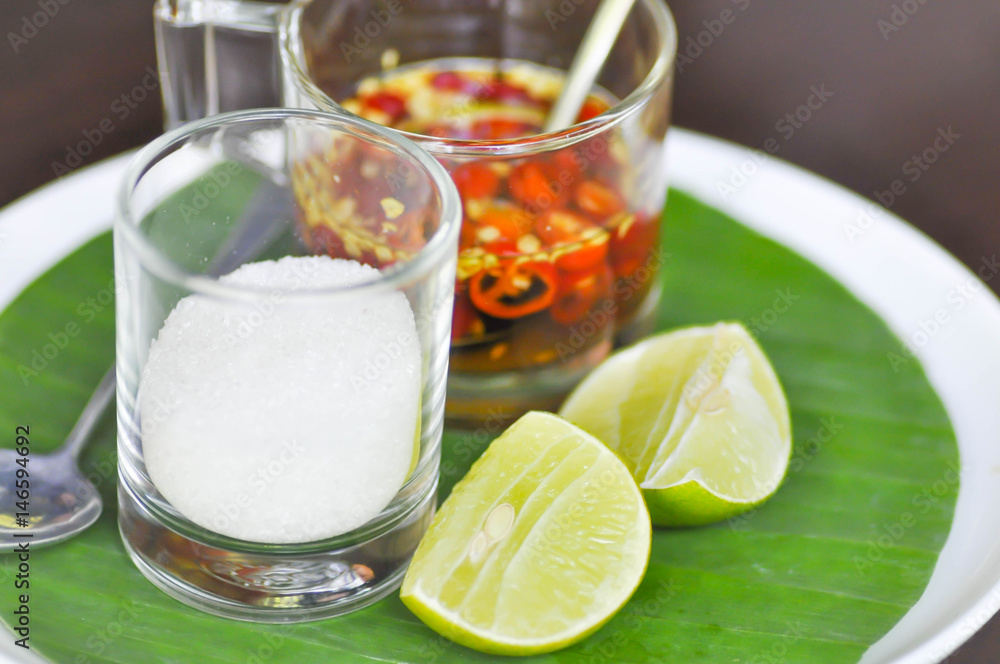 sugar, lime and fish sauce sugar, lime and fish sauce