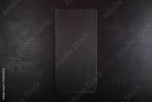Black background with black stone tray for product presentation