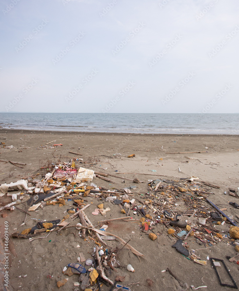 Garbage on beach, environmental pollution concept picture.