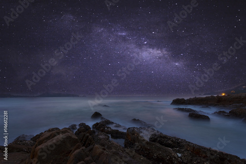 Canvas-taulu milky way galaxy with beautiful seascape long exposure.
