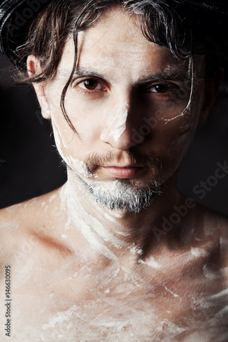 Male artist with dirty face 