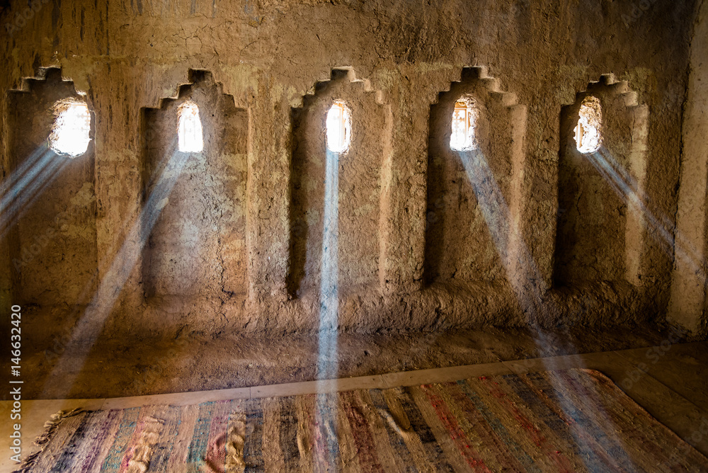 Naklejka premium Rays of sunlight in Amridil Kasbah - Morocco