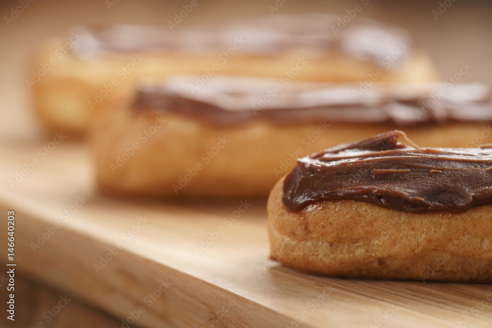 traditional french eclairs with chocolate ganache, shallow focus