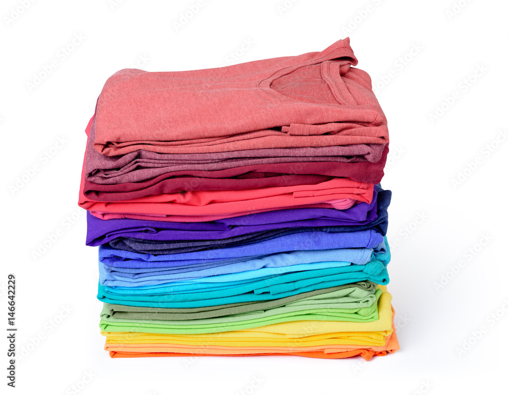 Stack of colorful t-shirt isolated on white background. File contains a path to isolation. 
