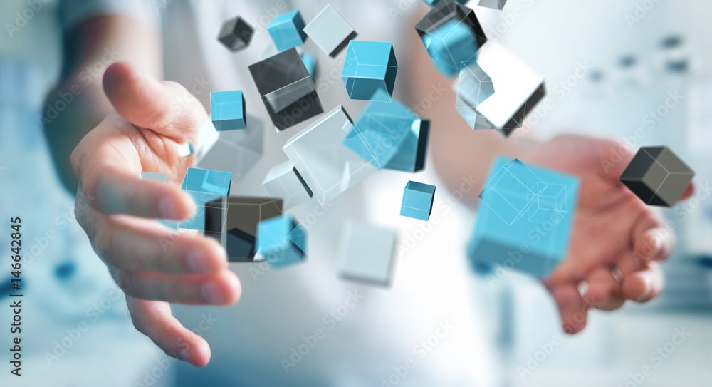 Businessman holding floating blue shiny cube network 3D rendering Businessman holding floating blue shiny cube network 3D rendering