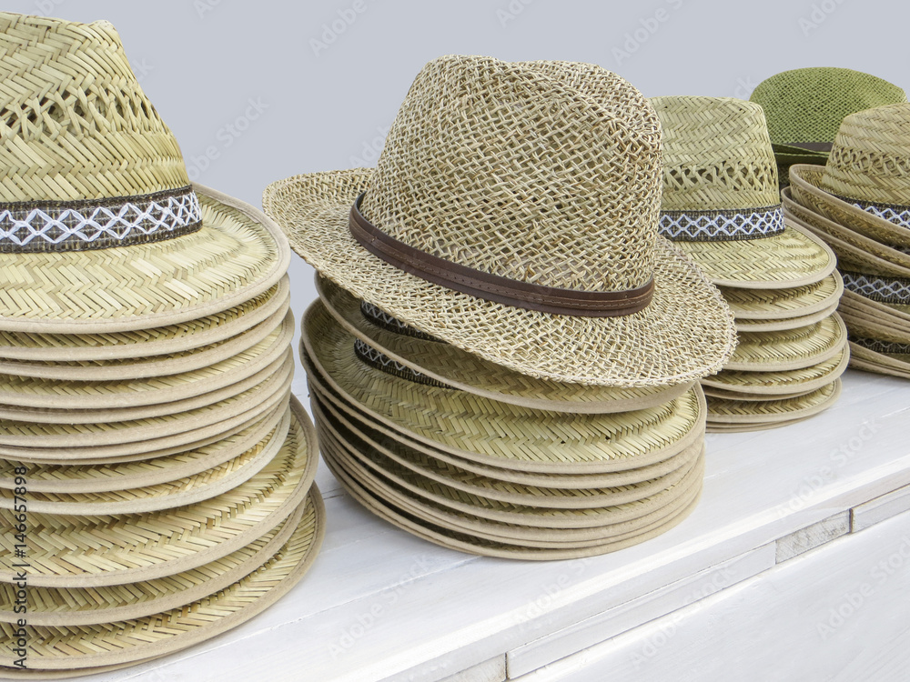 lots of straw hats