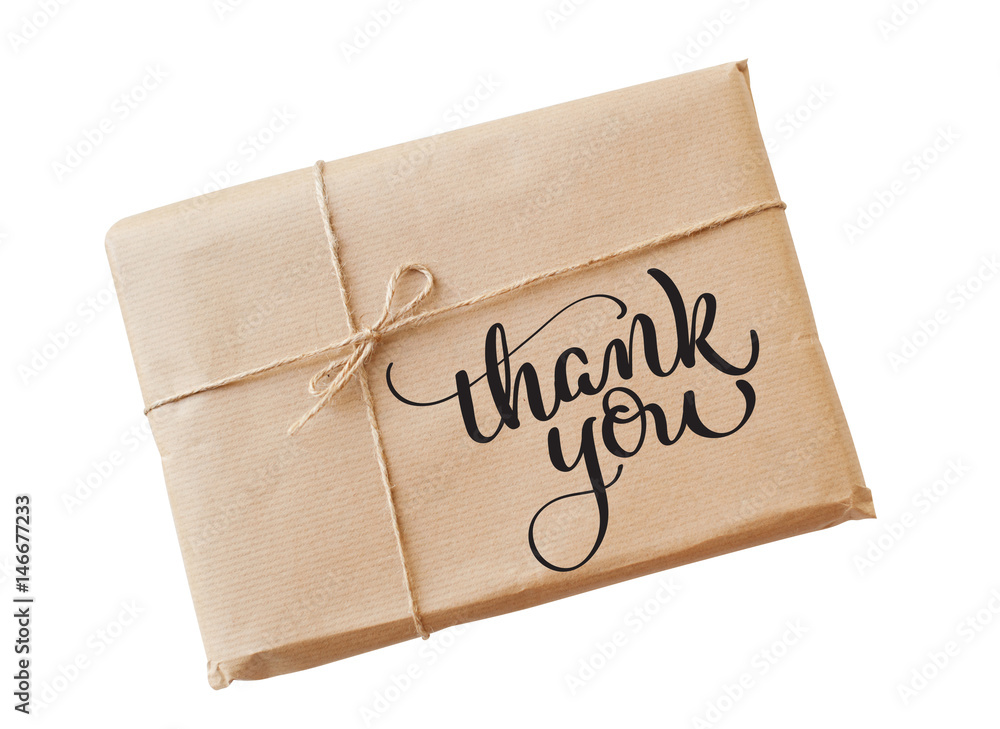 envelope kraft paper tied with string on a white background and text Thank you. Calligraphy lettering hand draw envelope kraft paper tied with string on a white background and text Thank you. Calligraphy lettering hand draw