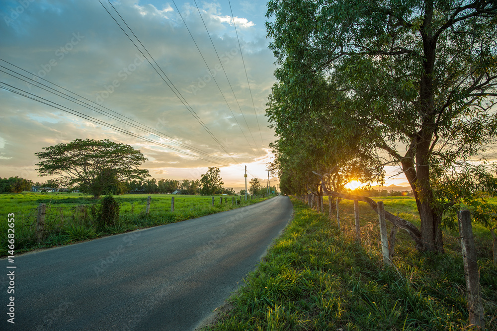 Countryside road sunset landscape