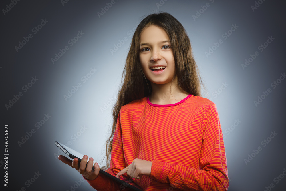 smiling young girl or teenager with tablet pc computer smiling young girl or teenager with tablet pc computer