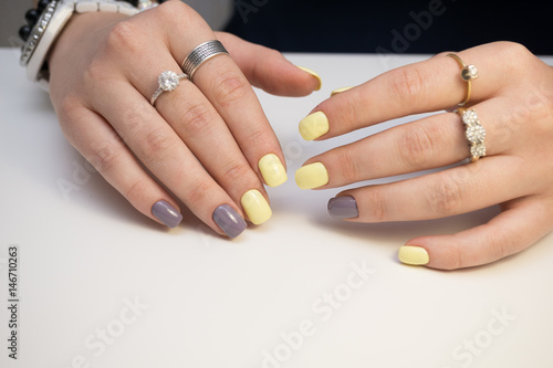 Attractive women s hands. Natural nails with beautiful manicure.