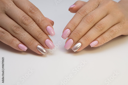 Attractive women's hands. Natural nails with beautiful manicure.