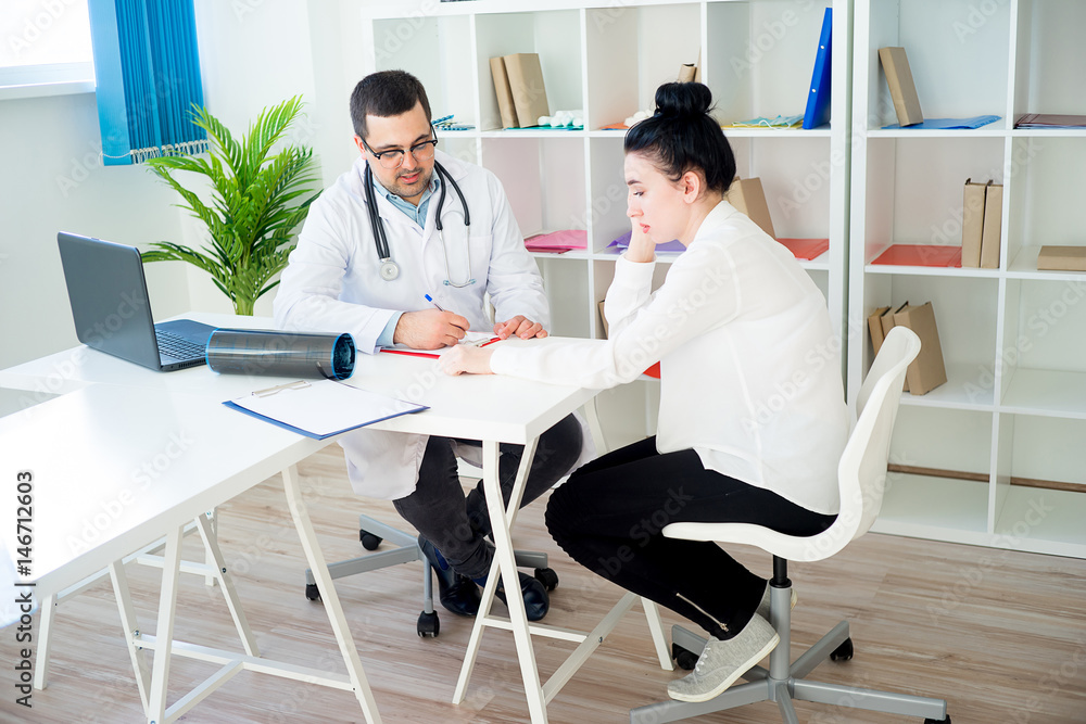 Doctor examining a woman Doctor examining a woman