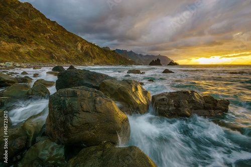 Dynamic and dramatic sunset over Benijo beach in Tenerife