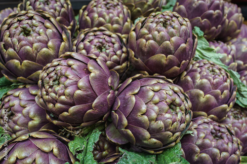 Closed up of fresh vegetable artichokes in italy market