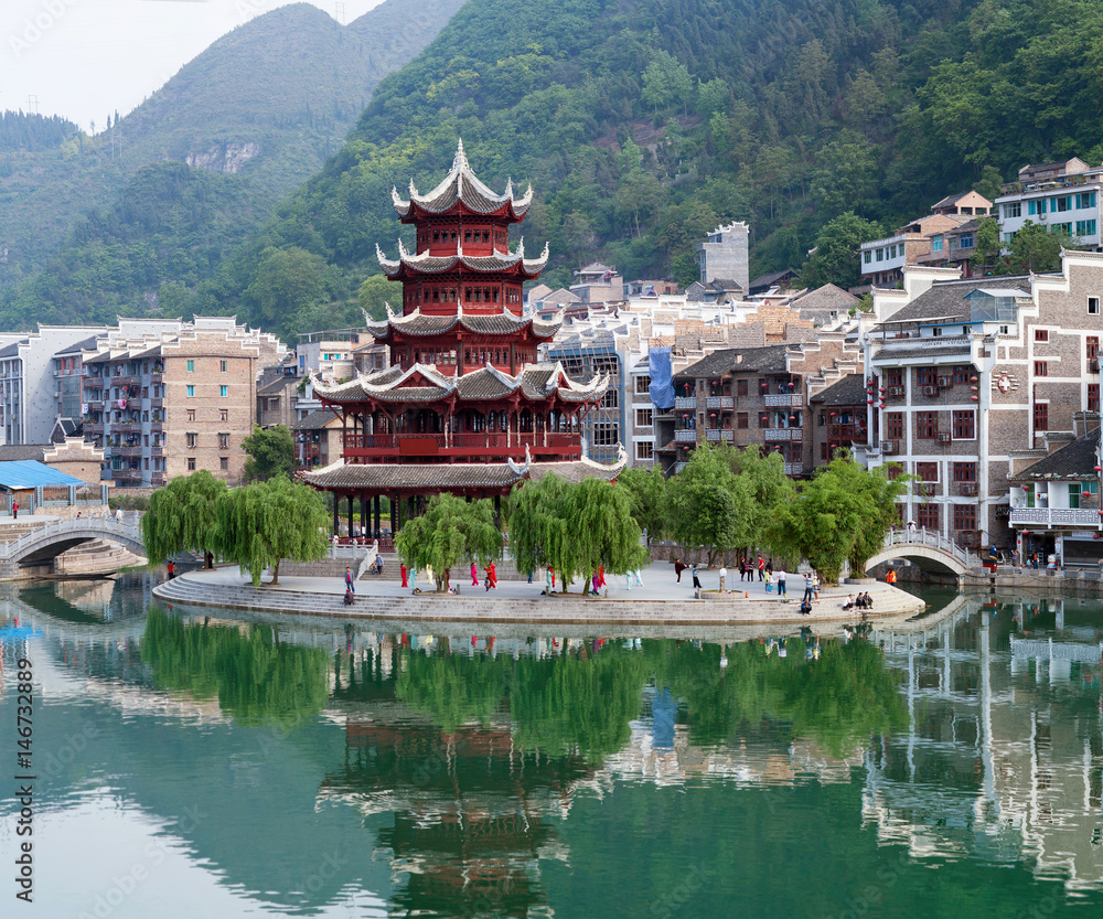 Fototapeta premium Ancient Pagoda in Zhenyuan Ancient Town on Wuyang river in Guizhou Province, China