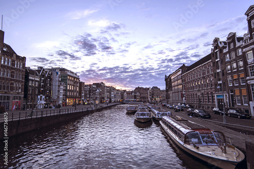 cityscape of the famous canals at Twilight time in Amsterdam  Netherlands