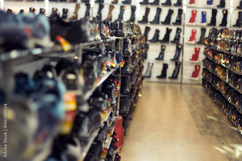 Obraz premium blurred background with shoes on shelves in a Shoe store