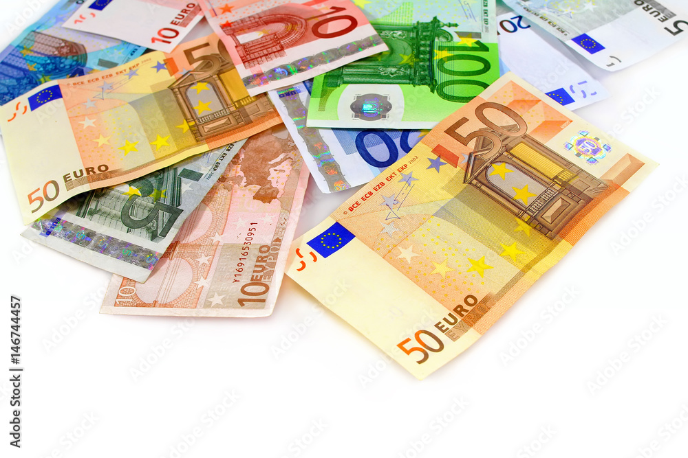 Pile of euro currency banknotes on white background Pile of euro currency banknotes on white background