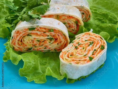 roll of pitta bread with spicy carrot photo