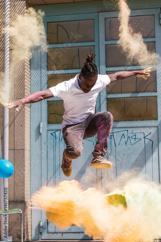 Skating Skater Skateboard with Holi Powder photo