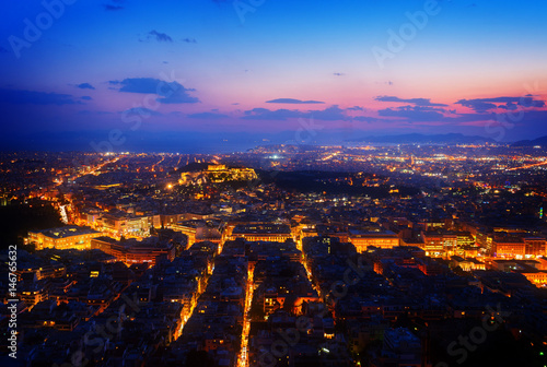 panoramic cityscape of Athens with Acorpolis hill and sea at night, Greecer, retro toned