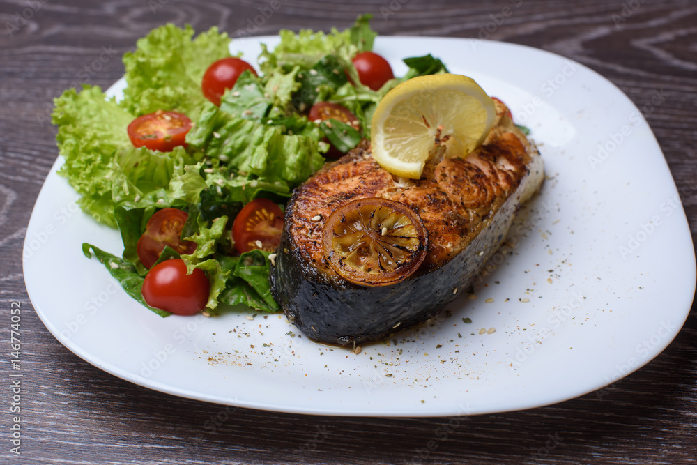 Grilled salmon on a plate