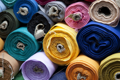 colourful fabric rolls on a street market