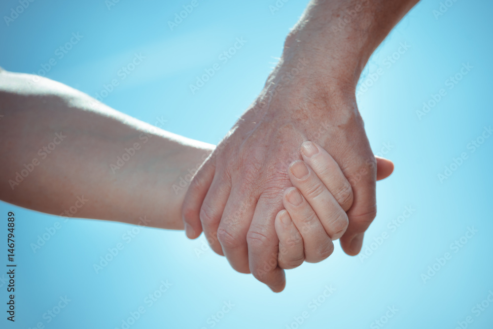 two hands holding together two hands holding together