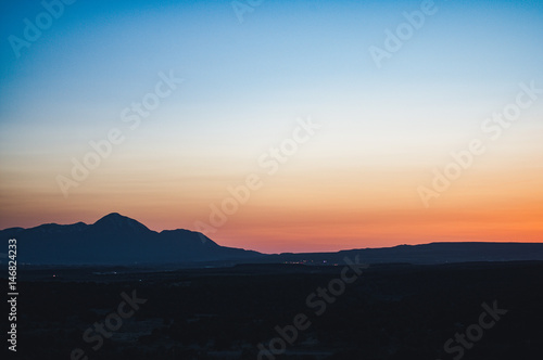 Desert Sunset Behind Sleeping Ute Mountains 