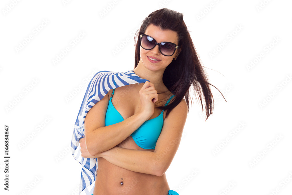 Fototapeta premium Woman in swimming suit with shawl and sunglasses