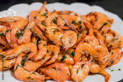 Shrimp seafood orange prawns detail dinner meal cooking home kitchen white plate dish background