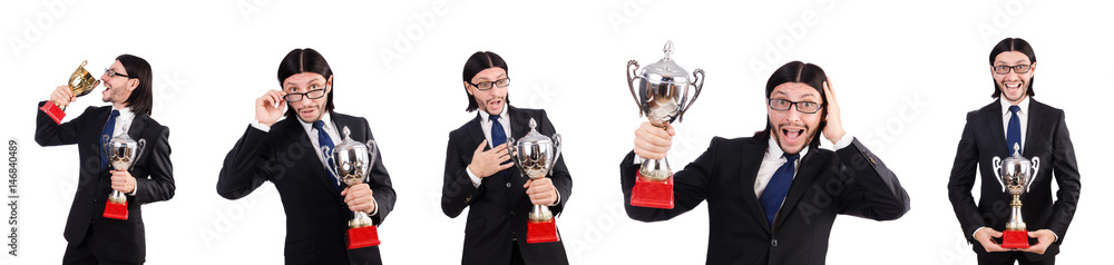 Businessman awarded with prize cup isolated on white Businessman awarded with prize cup isolated on white