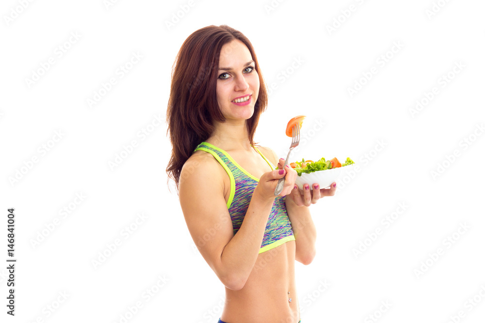 Sportive woman holding salad Sportive woman holding salad
