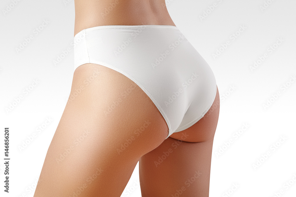 Spa, wellness. Healthy slim body. Beautiful sexy hips. Fitness or plastic surgery. Perfect buttocks without cellulite - obrazy, fototapety, plakaty 