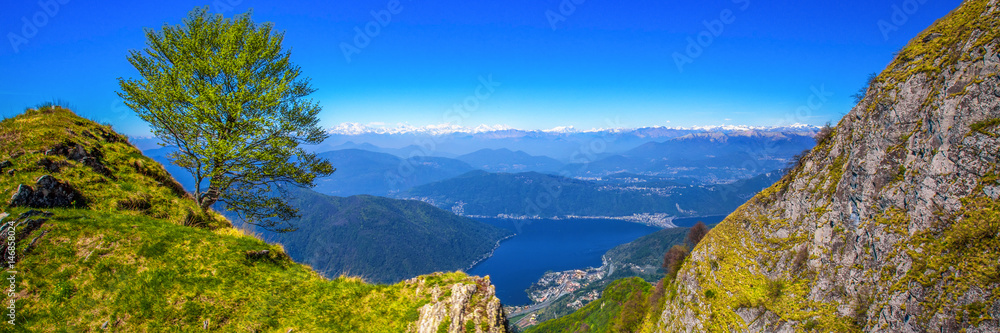 View to Lugano city, San Salvatore mountain and Lugano lake from Monte Generoso