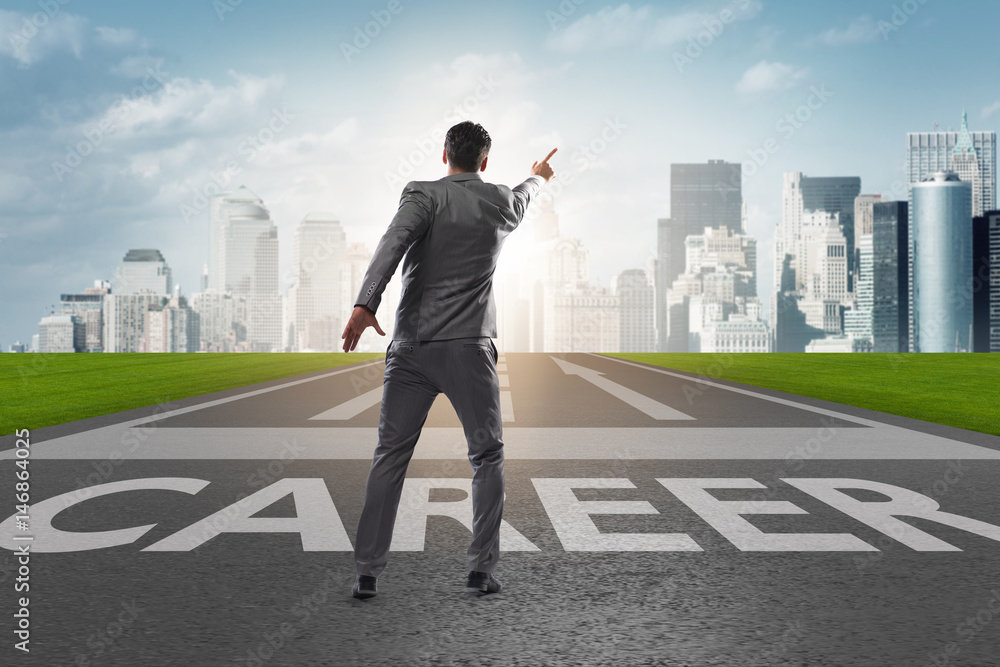 Businessman walking towards his career aspirations Businessman walking towards his career aspirations