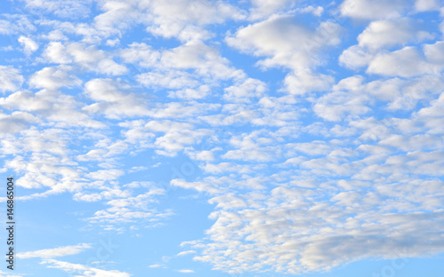 Blue sky and altocumulus clouds.